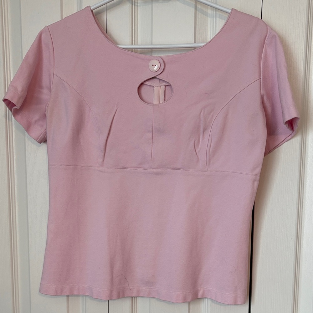 Pink top. PTP 18 but has stretch.